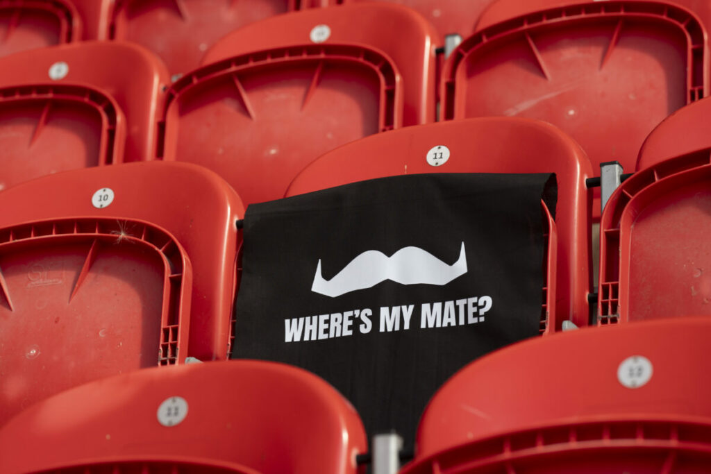Movember has teamed up football clubs in high male suicide rate areas to turn empty stadium seats into reminders for world suicide prevention day, depicted here.