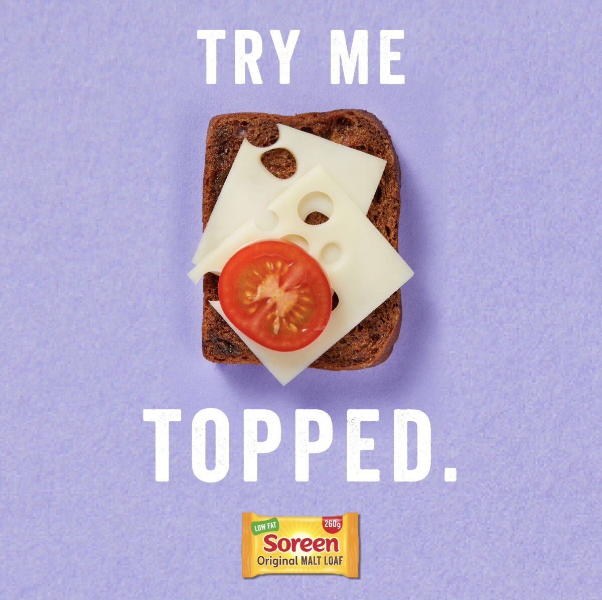 British malt loaf brand Soreen has today unveiled a new campaign leaning its fans' imagination with an ad encouraging consumers to try it "topped", depicted here with a purple background - showing Malt bread topped with cheese and a single tomato slice